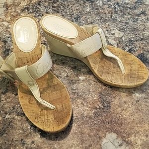 Coach used 7.5 tan and white platform